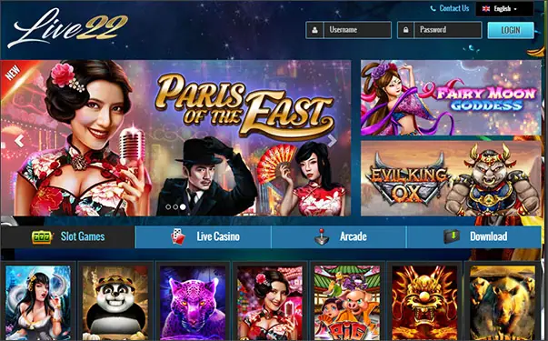 Live22 web portal with a Paris of the East banner, Fairy Moon Goddess and Evil King Ox tiles, a username and password login, and tabs for Slot Games, Live Casino, Arcade and Download