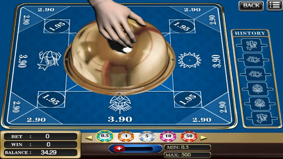 The dealer's hand lifting the brass dome on the 918Kiss Belangkai table